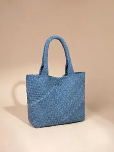 Handwoven blue denim texture tote bag with double handles in a classic rectangular shape