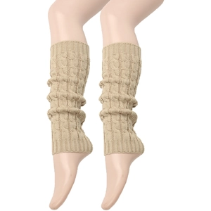 Detail of khaki cable knit leg warmers showing thick braided texture and ribbed cuffs
