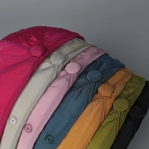 Close-up of quick-dry nylon baseball caps featuring fine stitching and embroidered eyelets