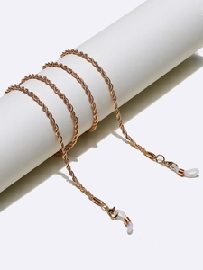Detail of 70cm gold metal rope chain eyewear strap with lobster clasps and silicone loops