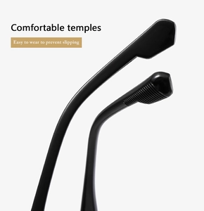 Macro detail of glossy black eyeglass temples with anti-slip texture and ergonomic curve
