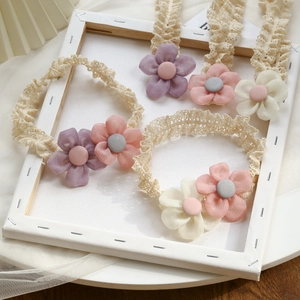 Set of lace floral baby headbands in pink and beige colors for infant photography