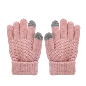 Close-up of pink knit winter gloves with grey touchscreen tips and elastic cuffs