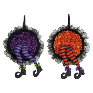 Detail of Halloween witch legs wreath in purple and orange stripes with lace accents