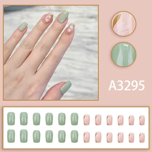 Green and pink press-on nails with white floral patterns and gold accents, 24 pieces set