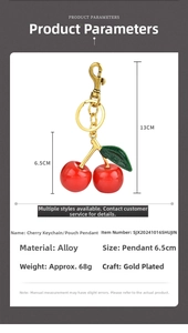 Detailed size specifications of the red resin cherry keychain with gold-plated hardware