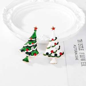 Christmas tree brooches with colorful rhinestones in green and white festive designs