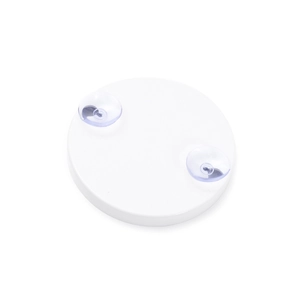 Rear view of round magnification mirror featuring two secure transparent suction cups