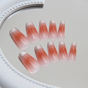 Pink ombre French cat-eye press-on nails with silver glitter in long coffin shape