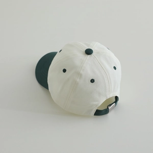 Kids baseball cap in white and green with adjustable metal buckle back view
