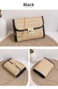 Detail view of woven straw bag with black leather trim and golden metal chain strap