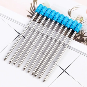Close-up of 10 silver metal ballpoint pen refills with blue plastic end plugs