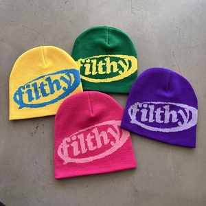 Colorful knit beanies with filthy logo in yellow, green, pink and purple shades