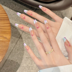 Long trapezoidal press-on nails featuring gradient geometric lines in blue and white