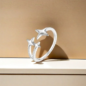 Detailed shot of S925 sterling silver star ring with engraved textured band and S925 hallmark