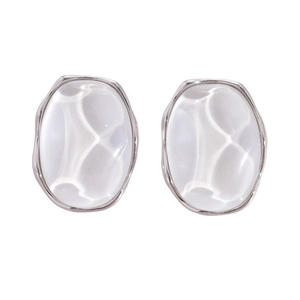Minimalist oval resin stud earrings with silver borders and shimmering texture on white