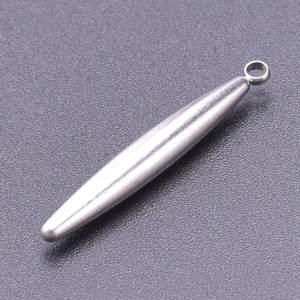 Macro detail of silver teardrop pendant with brushed stainless steel finish and small ring