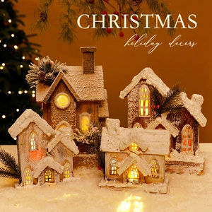 Set of four LED lighted wooden Christmas houses with artificial snow and pine decor