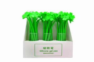 Bulk display of green clover-shaped silicone gel pens in a 48-count retail box