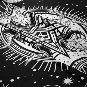 Detailed view of black gothic tapestry fabric with white ram skull and moon patterns