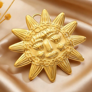 Detailed macro shot of golden sun brooch with facial relief on luxurious satin fabric