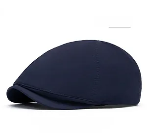 Side profile of navy blue quick-dry flat cap showing the lightweight textured fabric