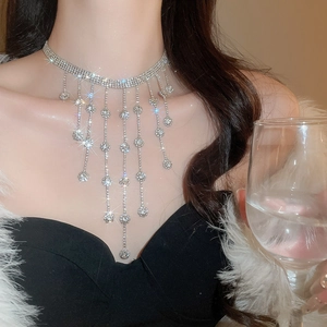 Close-up of luxury rhinestone tassel necklace with elegant silver-tone diamond fringe