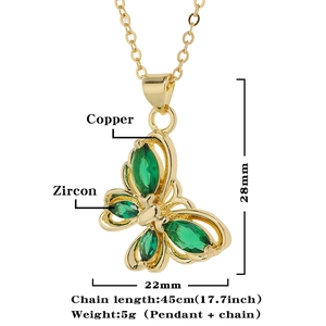 Detail view of 18k gold plated copper butterfly pendant with green zircon and dimensions