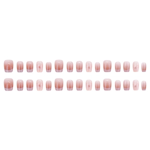 Pink gradient press-on nails with white star patterns and glossy finish, 24 pieces set