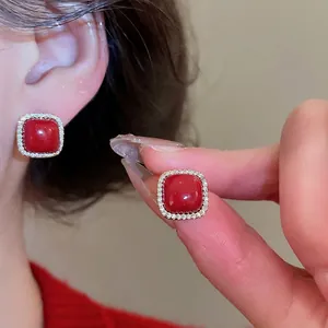 Elegant geometric red zircon earrings with square ruby-style stone and micro-pave frame
