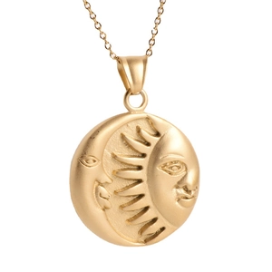 Vintage 18K gold plated sun and moon embossed circular pendant necklace on white background