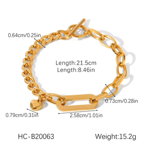 Detail showing gold stainless steel heart charm bracelet with OT toggle clasp and dimensions
