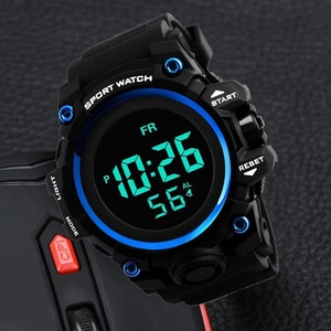 Detail of digital sports watch dial with blue luminous ring and green led display