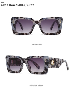 Front and side view of retro grey hawksbill sunglasses with gold ring detail