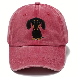 Close-up of a washed cotton baseball cap with a cute dachshund print and stitching