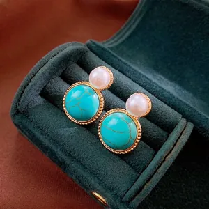 Vintage round turquoise stone stud earrings with pearl accent and gold rim in velvet box