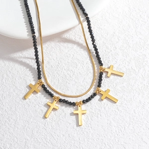 Vintage double layer necklace with gold snake chain, black beads and five cross pendants