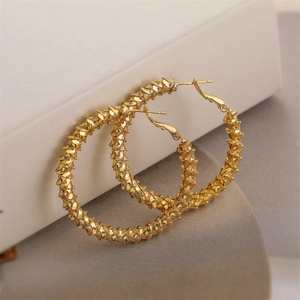 Elegant gold-plated C-shaped hoop earrings with a textured woven design for women