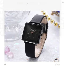 Detail shot of a vintage square quartz watch with black leather strap and rose gold hands