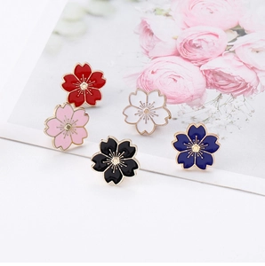 Detail of five-color enamel cherry blossom brooches with gold plating and floral petals