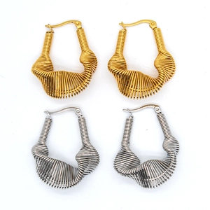 Exaggerated multi-wire gold and silver stainless steel earrings with geometric wire design