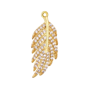 Detail of gold-plated feather pendant with sparkling crystals and hanging loop