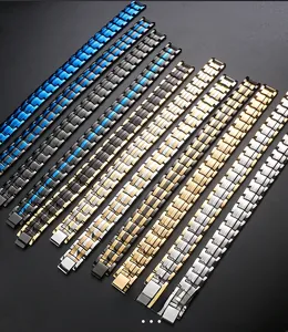 Detail view of titanium steel magnetic bracelets showing various colors and folding clasps