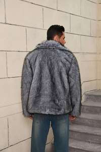 Rear view of men's premium grey faux fur jacket with thick texture on outdoor steps