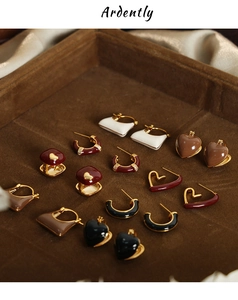 Collection of geometric heart-shaped enamel earrings in gold-plated stainless steel