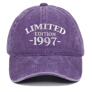 Detail of white Limited Edition 1997 embroidery on purple washed cotton baseball cap