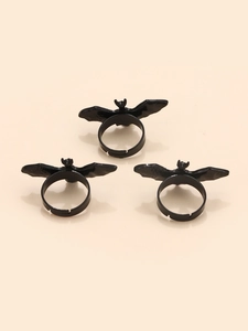 Detailed view of three black gothic bat rings with adjustable open bands for Halloween