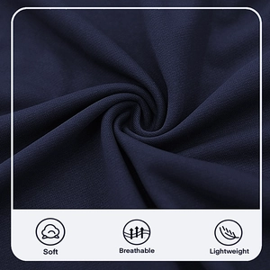 Detail showing soft, breathable and lightweight navy blue fabric texture of the polo shirt