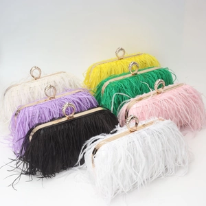 Detailed collection of ostrich feather evening bags with sparkling ring clasps in various colors