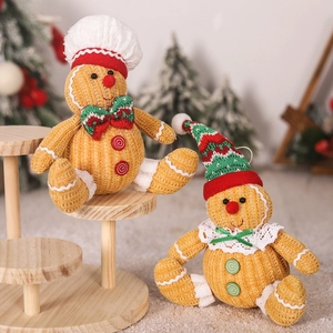Detail van de corduroy textuur en feestelijke decoraties op de peperkoekman poppen